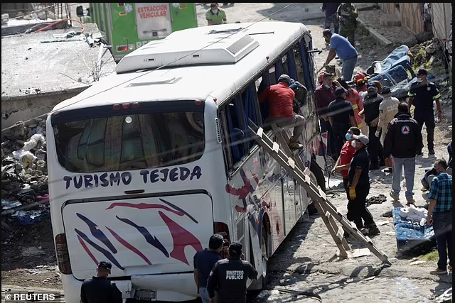 Nineteen people dead and 32 more injured after bus carrying Catholic pilgrims to religious site in Mexico crashed into a building (photos)