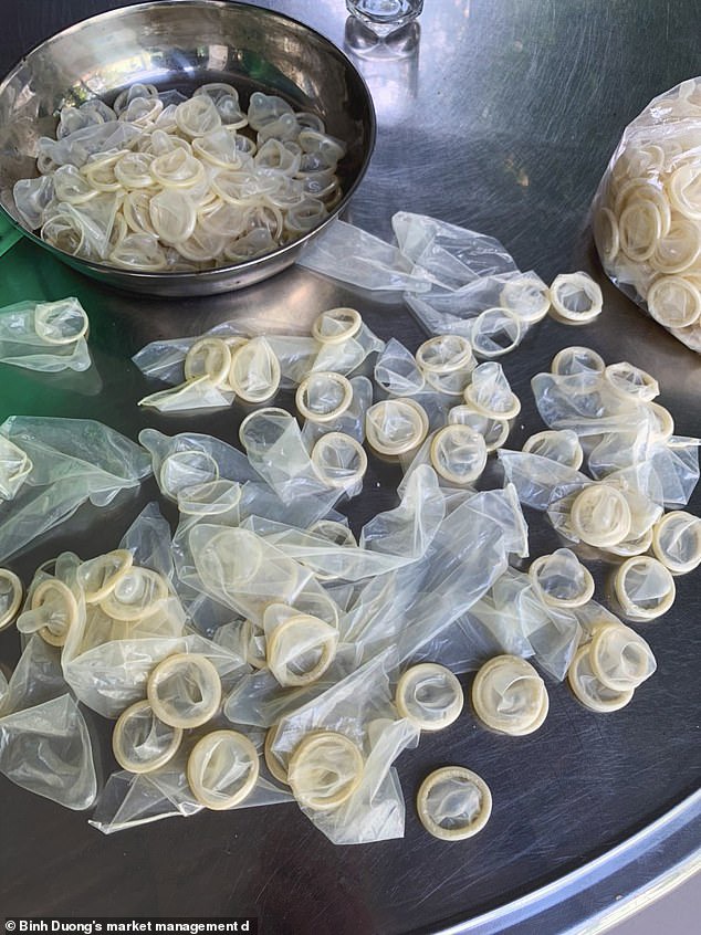 Police seize 324,000 used condoms as they bust factory repackaging them and selling back to the public (photos)