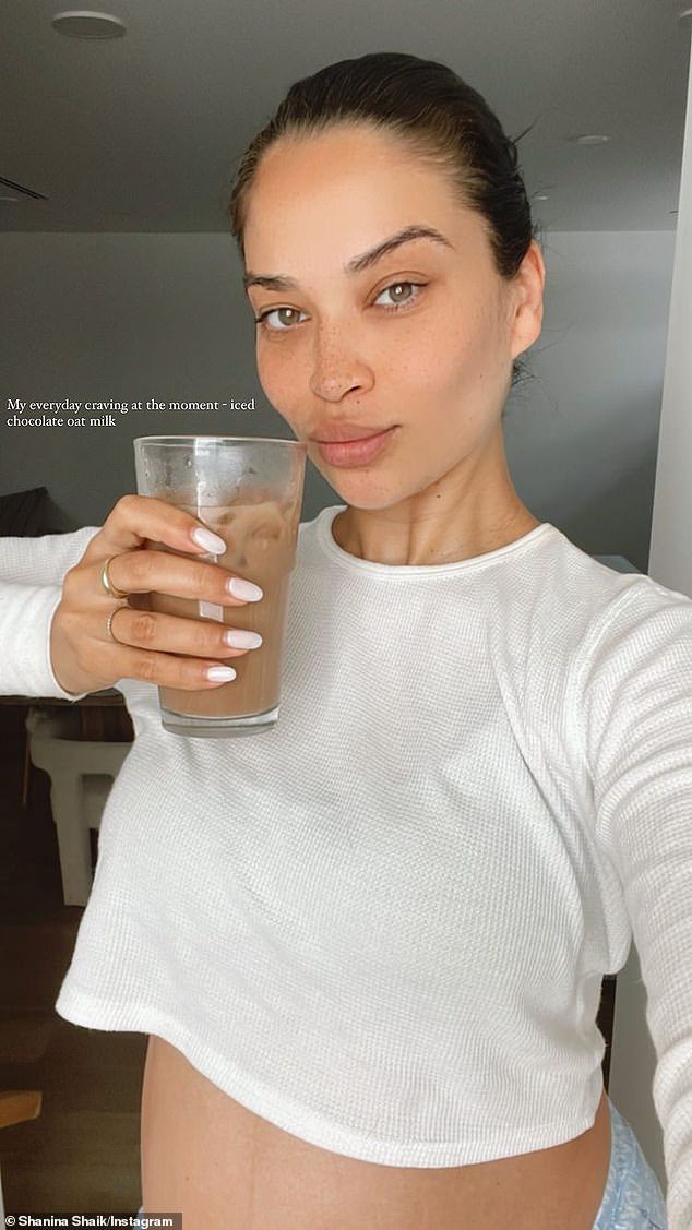 Shanina Shaik shows off her incredible figure in a skimpy blue bikini