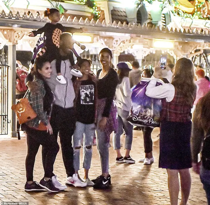 Kobe Bryant was pictured at Disneyland with daughter Bianka, four, on his shoulders and his arms around wife Vanessa (left) and daughter Gianna, 13 (second right). Eldest daughter Natalia, 17, is on the right of the snap taken just weeks before the tragic helicopter crash