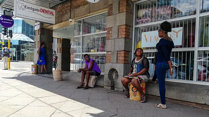 Illegal money traders who used to flood the streets of Harare and Mutare are now working from home while Zimbabwe is under lockdown to curb the spread of coronavirus [File: Farai Matiashe/Al Jazeera]