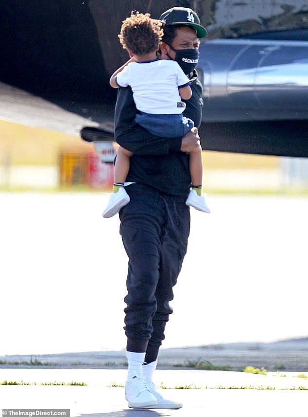 Beyonce and Jay-Z pictured for the first time since lockdown as they exit their private jet with Blue Ivy and their twins for a getaway in the Hamptons