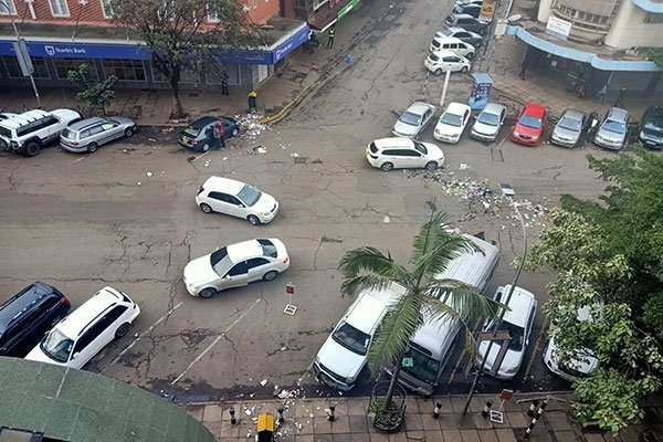 Kimathi Street in the Nairobi city centre just moments after garbage collectors littered the road with trash.