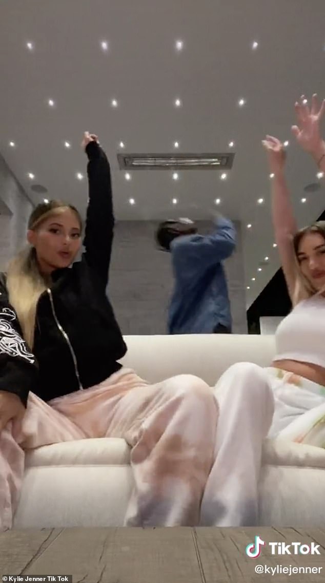 Surprise! The 22-year-old makeup mogul shared an close up image of them cuddling as she captioned it: 'Happy birthday @travisscott!!! Stormis parents [sic]!!!!!' before sharing a Tik Tok with Travis seen in the background