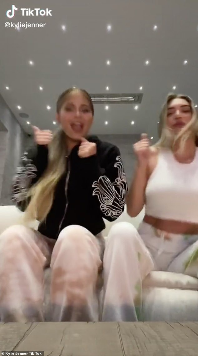 In the moment: They were dancing around Kylie's 15,350 square foot $36 million mansion in Holmby Hills before sitting down to dance along to Travis' song