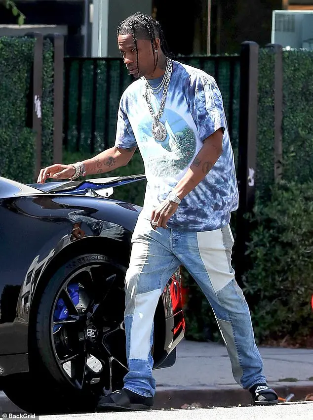 Birthday boy: Travis Scott was spotted showing off his brand new Bugatti while out with his crew in West Hollywood on Thursday afternoon