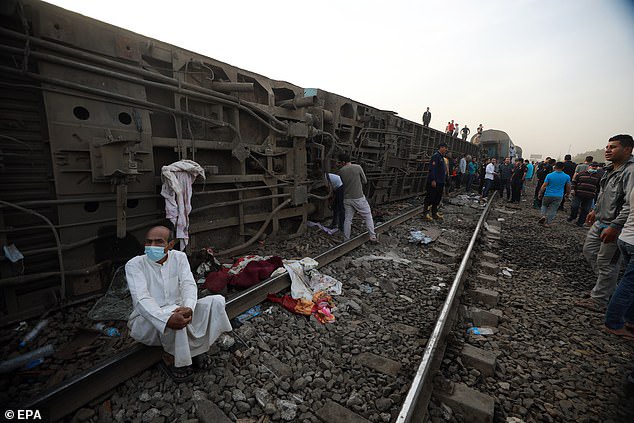 At least 11 people are killed and 100 injured as four passenger train carriages derail in Egypt?(photos)