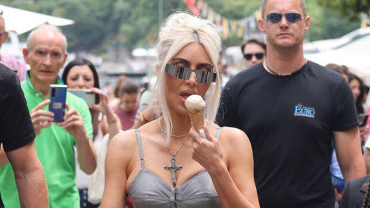 Kim Kardashian grabs ice cream with North and Penelope wearing striking corset co-ord before Kourtney and Travis Barker’s Italian wedding