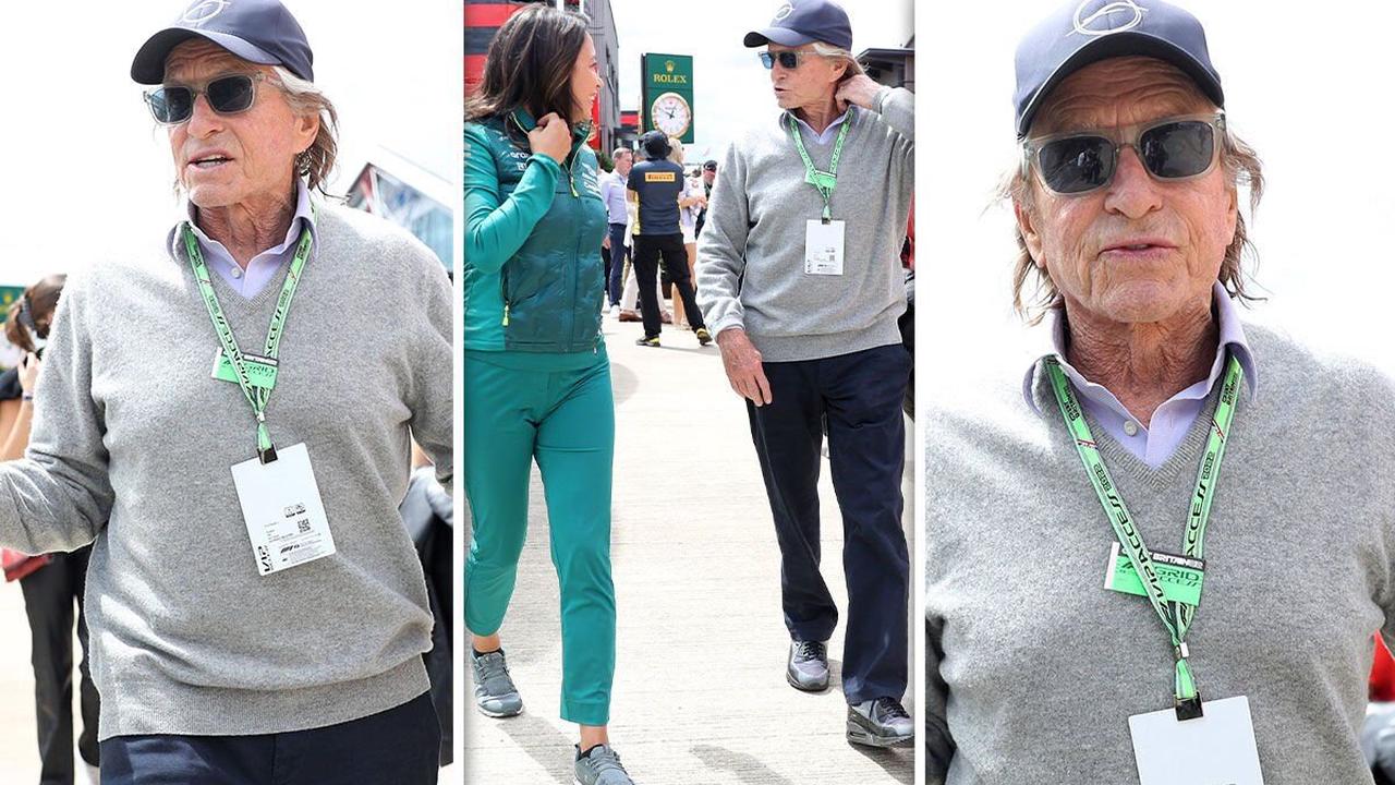 Michael Douglas, 77, looks sprightly as he gets into passionate chat at British Grand Prix