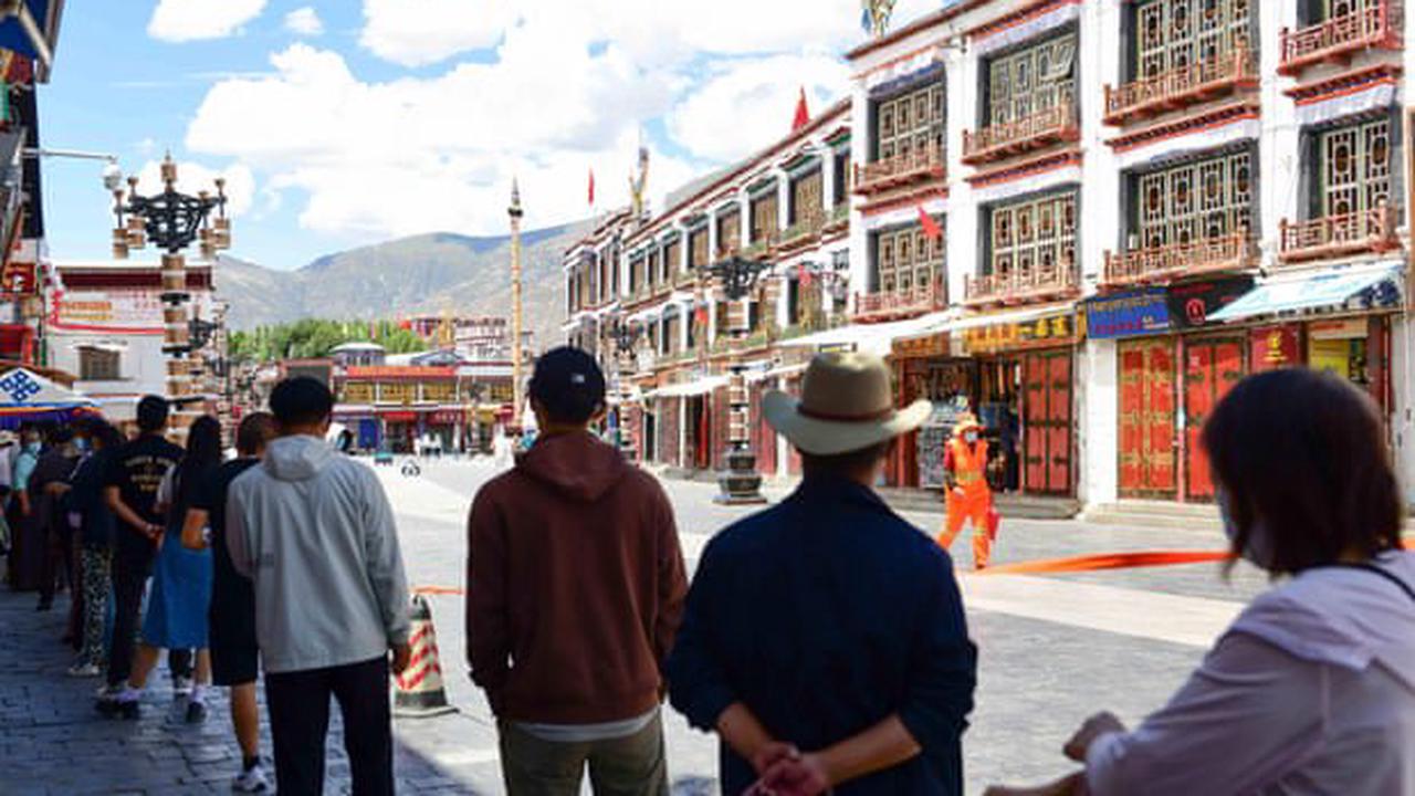 China battles Covid outbreaks in tourism hubs of Tibet and Hainan