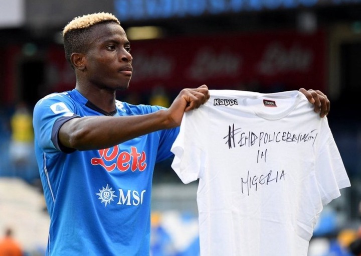 #EndSARS: Super Eagles striker, Victor Osimhen holds up a shirt saying "End Police Brutality In Nigeria" after scoring his first goal for Napoli (photos)