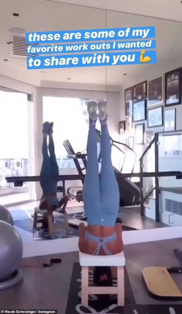 Look at her go: Her fans were in for a treat as she showcased her flexibility while performing a headstand split as she shared her favourite workout routines