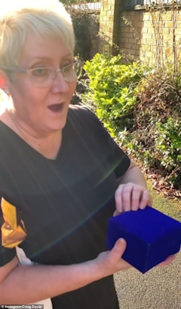 Shock: In a video posted to Twitter, the singer shared his surprise which included a series of Willy Wonka themed clues for his mum, Tina, that led her to the car parked outside