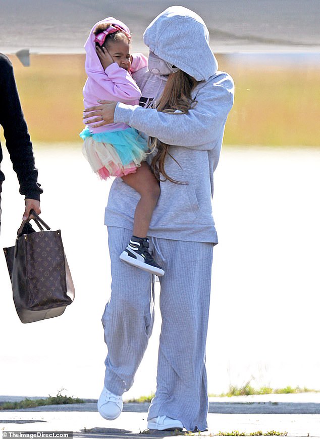 Beyonce and Jay-Z pictured for the first time since lockdown as they exit their private jet with Blue Ivy and their twins for a getaway in the Hamptons