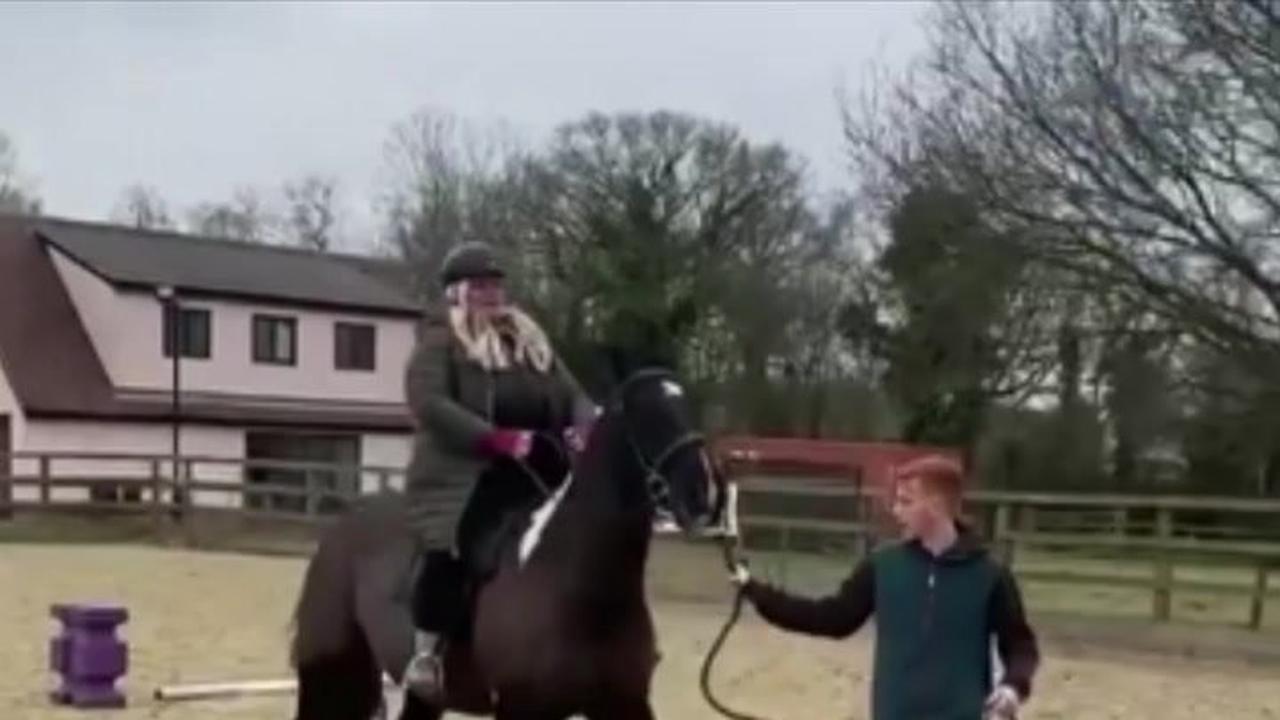 Gemma Collins plummets to the ground after being thrown off horse during riding lesson