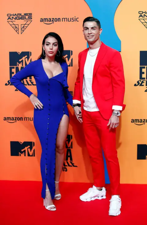 Cristiano Ronaldo and Georgina Rodriguez pose on a red carpet as they arrive at the 2019 MTV Europe Music Awards at the FIBES Conference and Exhibition Centre in Seville, Spain, November 3, 2019. REUTERS/Jon Nazca