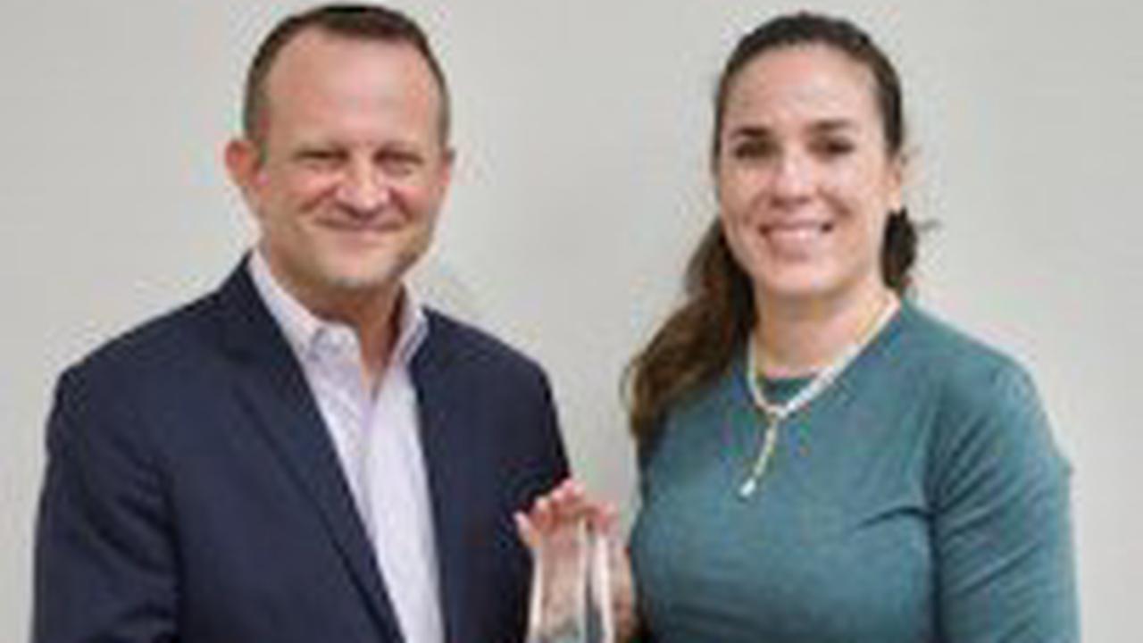 JMX Brands Honors Dr. Kari-Jo Koshes with President’s Award