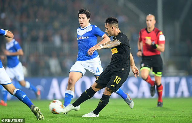 Inter Milan's Lautaro Martinez scores their first goal via a wild deflection that duped the keeper