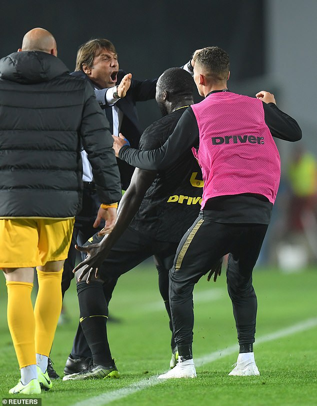 Inter Milan's Romelu Lukaku celebrates scoring their second goal with coach Antonio Conte