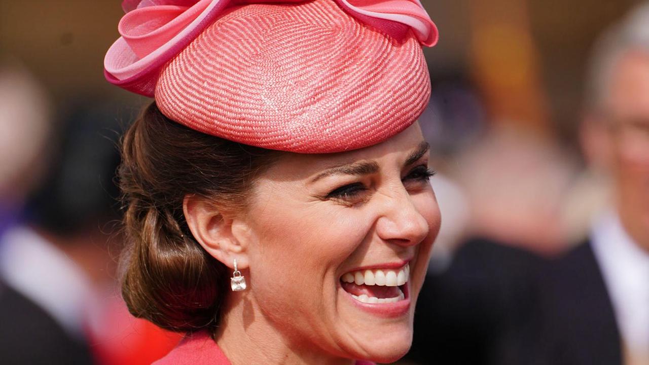 Kate Middleton is a vision of beauty in vibrant summer dress and striking accessory