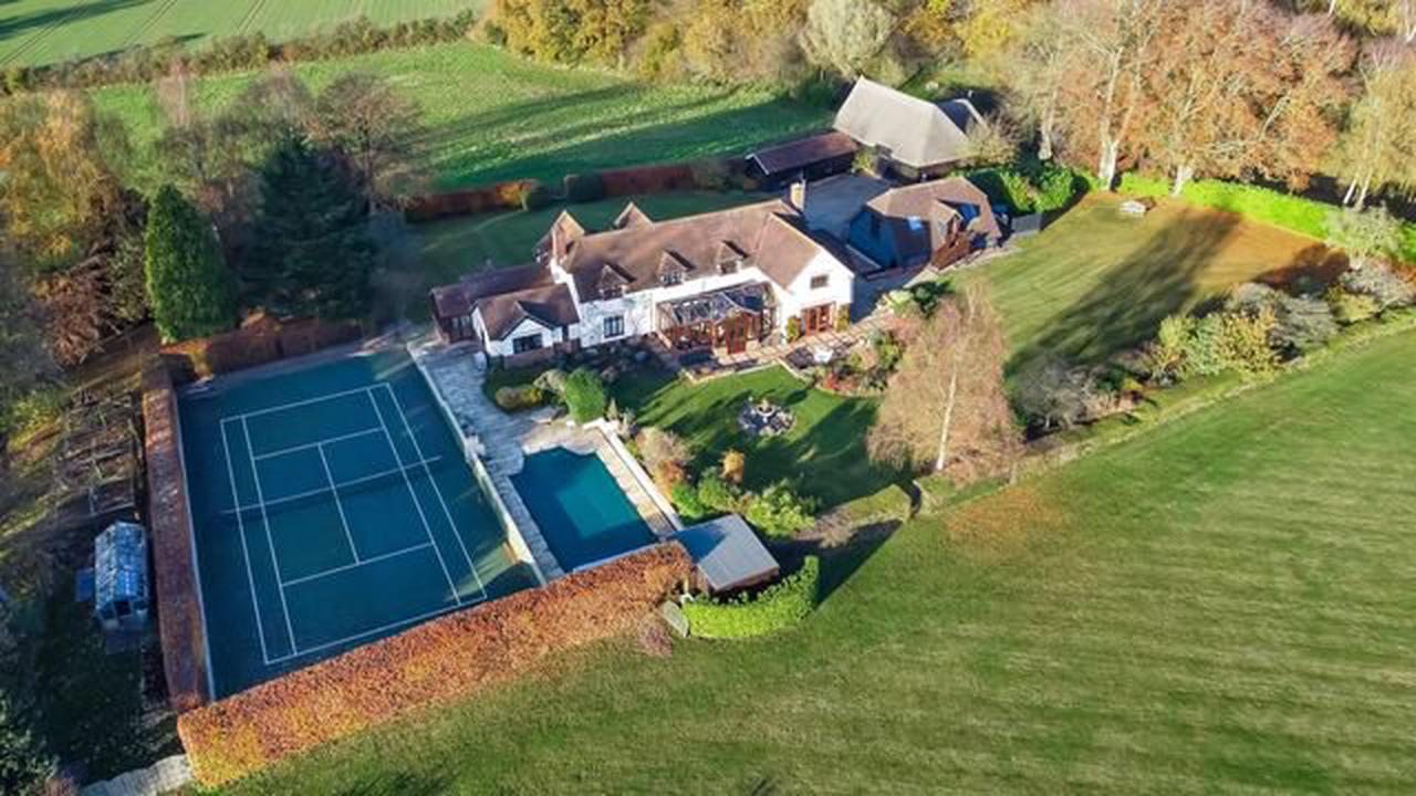 Look inside this 1920s lodge with a swimming pool and tennis court