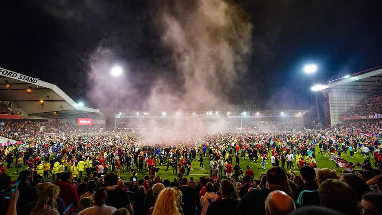 Man arrested after Billy Sharp assaulted during Nottingham Forest pitch invasion in Championship play-offs