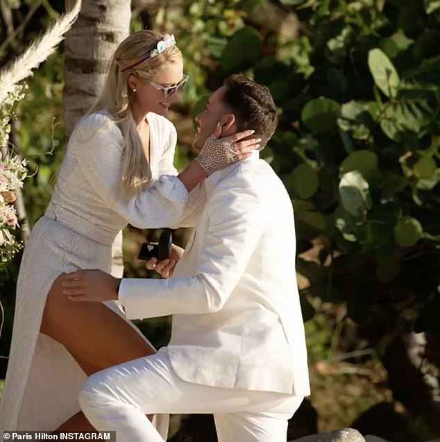 Paris Hilton is engaged for a fourth time as boyfriend of one-year Carter Reum proposes to her with huge emerald cut diamond ring?(Photos/Video)