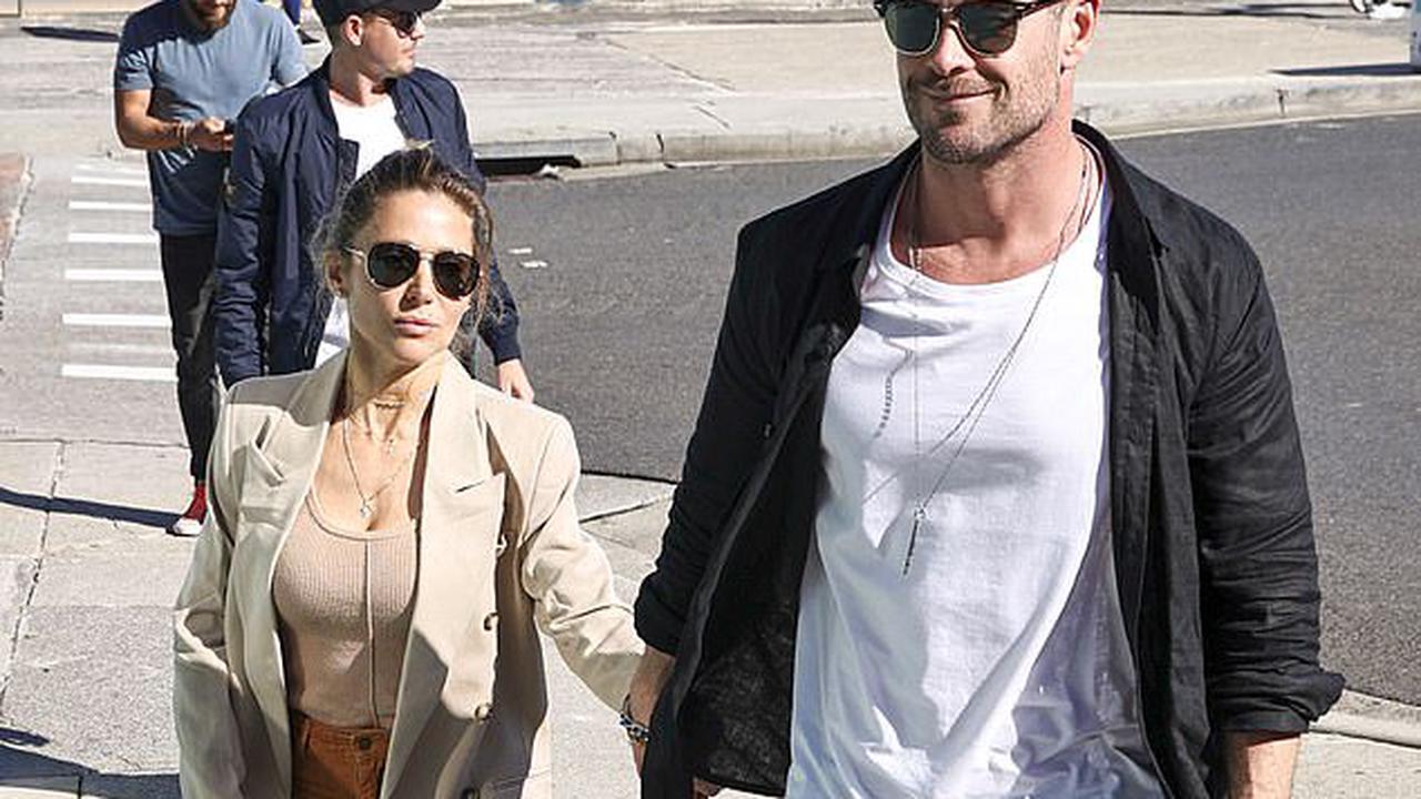 Romance isn't dead! Chris Hemsworth holds hands with wife Elsa Pataky as they join friends including Lauren Phillips for lunch at Bondi Beach