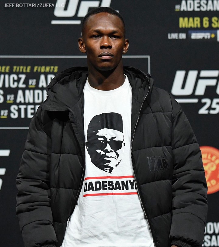 Nigerian MMA fighter, Israel Adesanya honours his father and buys his mom a Porsche ahead of his next fight on Saturday (Photos)