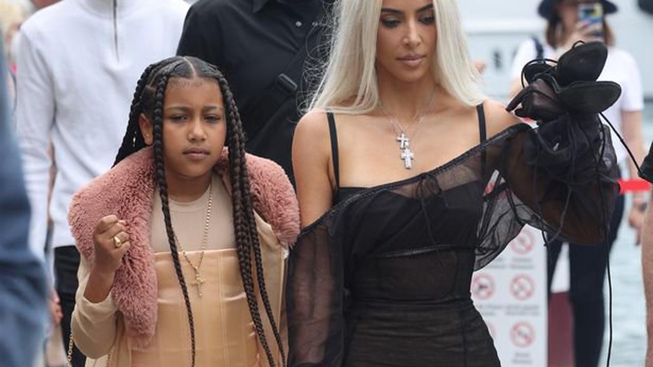 Kim Kardashian goes barefoot and ditches high heels while out with daughter North in Italy