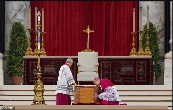 Pope Francis presides as Pope Benedict XVI is laid to rest (photos)