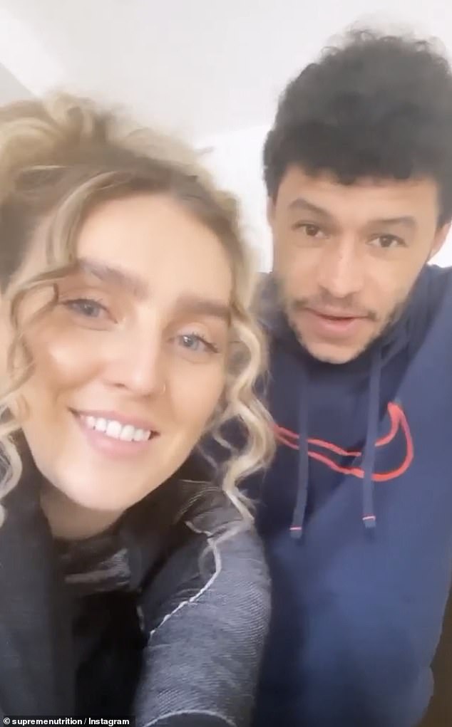 Need a trim? The Liverpool footballer finally agreed to let his Little Mix star girlfriend cut his hair after showing the extent of his 'flourishing' afro