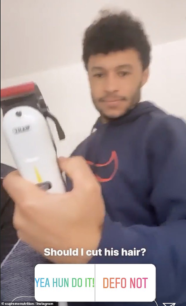 He's keen! As she made her confession, Alex walked back into shot holding up an electric razor to the camera