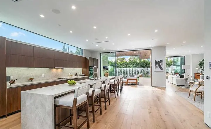 Inside John Legend and Chrissy Teigen's new property: Couple have bought a $5.1million four-bedroom 'organic modern' WeHo mansion near to their current home - its not known if it is simply an investment purchase
