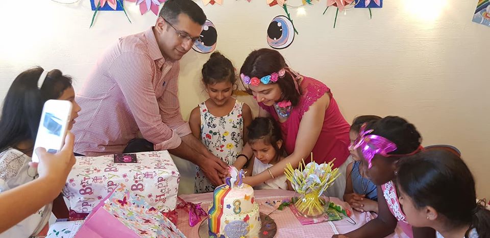 Image may contain: 3 people, people smiling