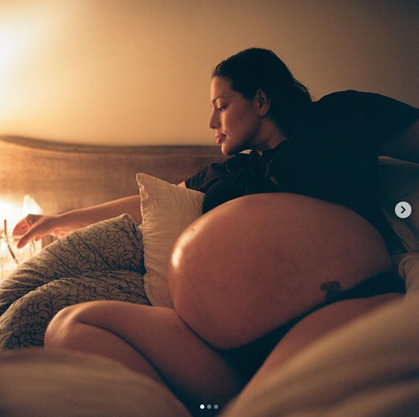 Heavily pregnant Ashley Graham reveals her full-term belly in a series of photos ahead of giving birth to twins (photos)