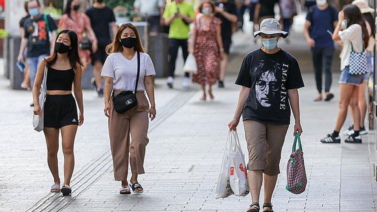 'Increasing pressure' to bring back hated mask mandates across Australia amid looming third Covid wave and raging flu season - with hundreds of thousands of workers predicted to stay at home over the coming weeks