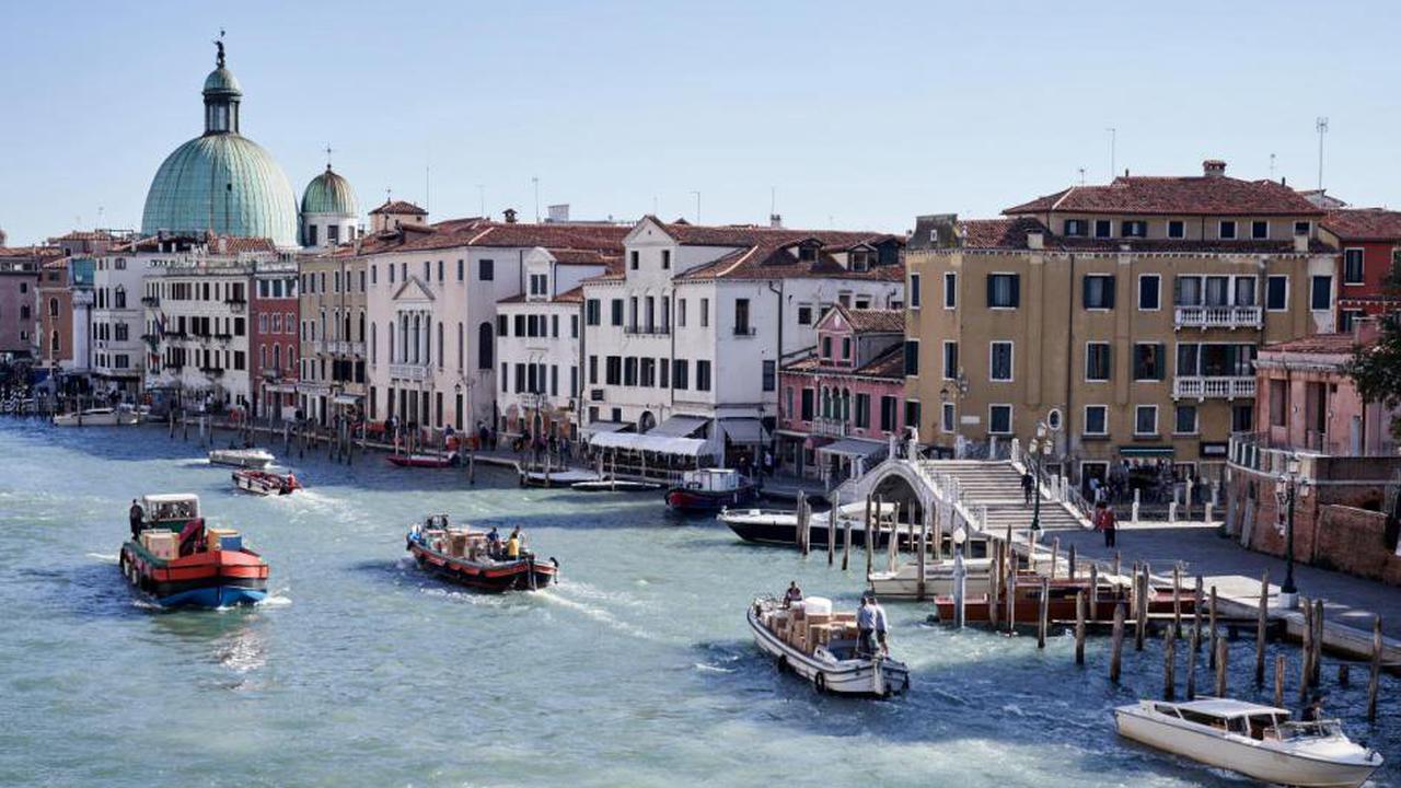 Venice mayor outraged at surfers motoring down Grand Canal