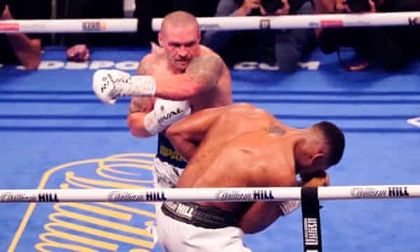 Anthony Joshua is rocked by a left hook from Oleksandr Usyk.