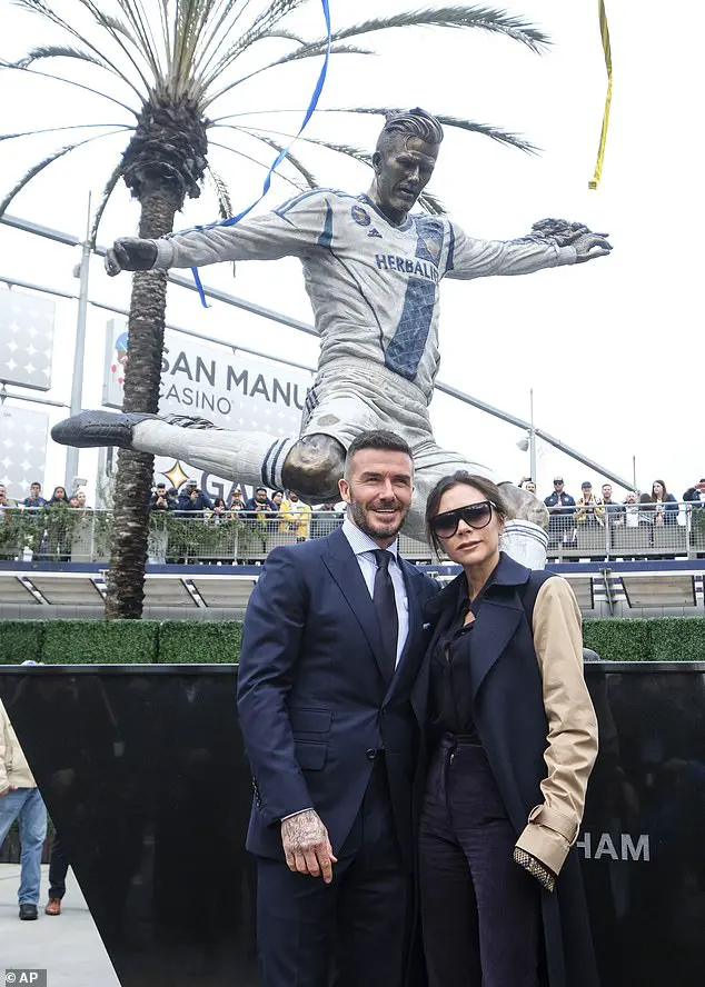 Unveiling: Victoria joined him for the momentous occasion and looked chic in a brown-sleeved jacket and her stylish sunglasses