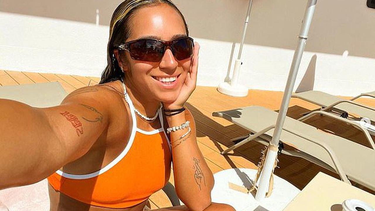 'Unnecessary but very necessary': Chelsee Grimes continues her girls' holiday with new gal pal Christine McGuinness as she sunbathes topless