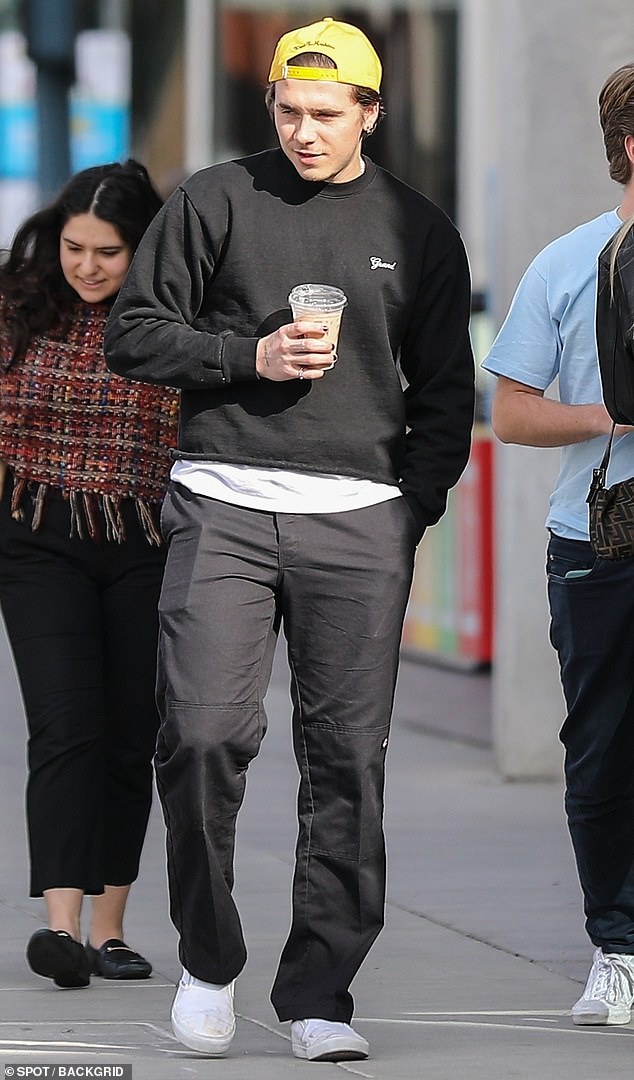 Details: While out, the eldest Beckham rocked a black sweater and matching pants while showing off his freshly manicured nails