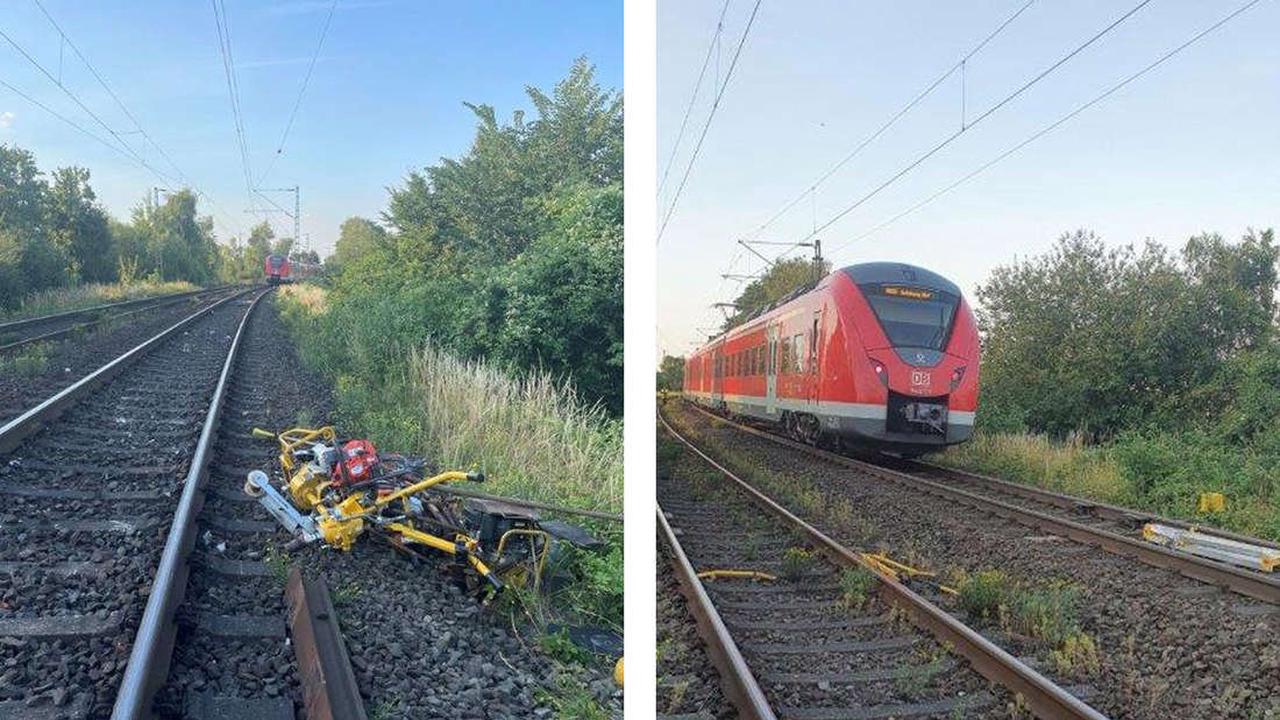 Bahn fährt in Baustelle – Arbeiter auf den Schienen können sich retten