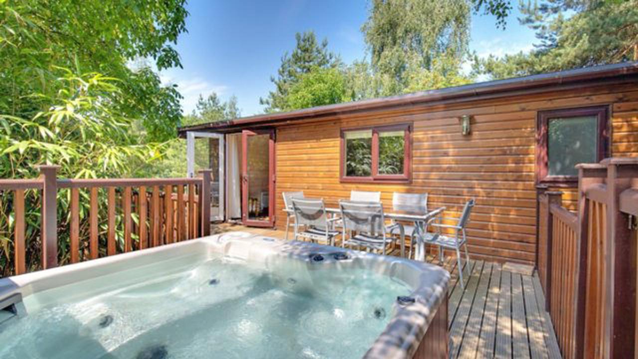 Holiday lodges with hot tubs you can buy for under £200,000
