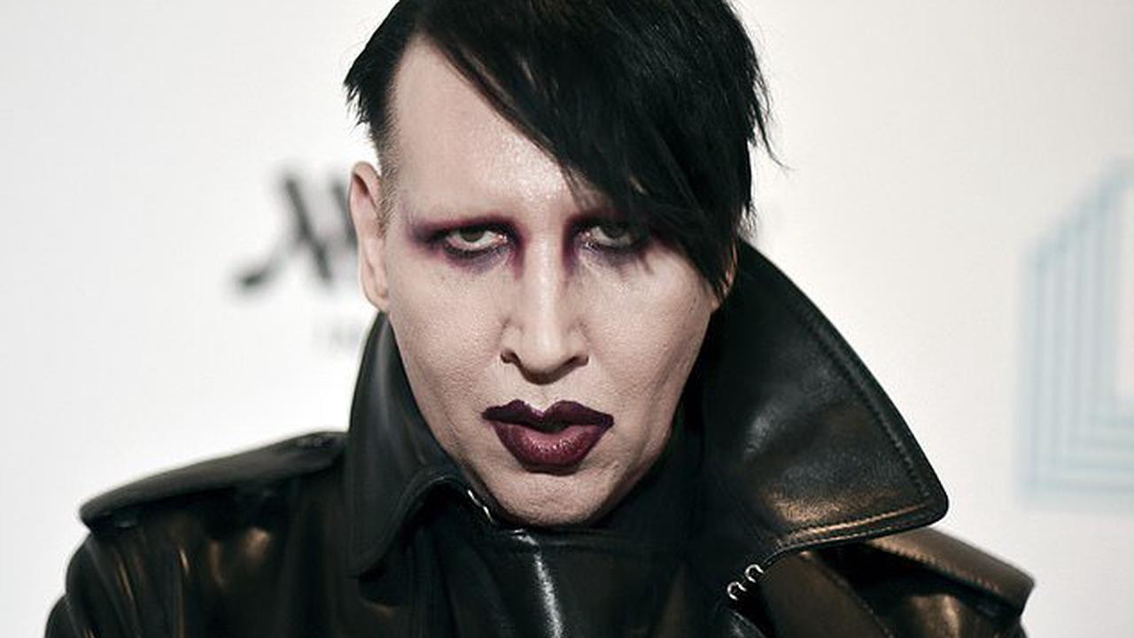 Marilyn Manson's West Hollywood apartment is RAIDED by sheriff's investigators who seized hard drives while probing claims he sexually assaulted multiple women including his actress ex Evan Rachel Wood