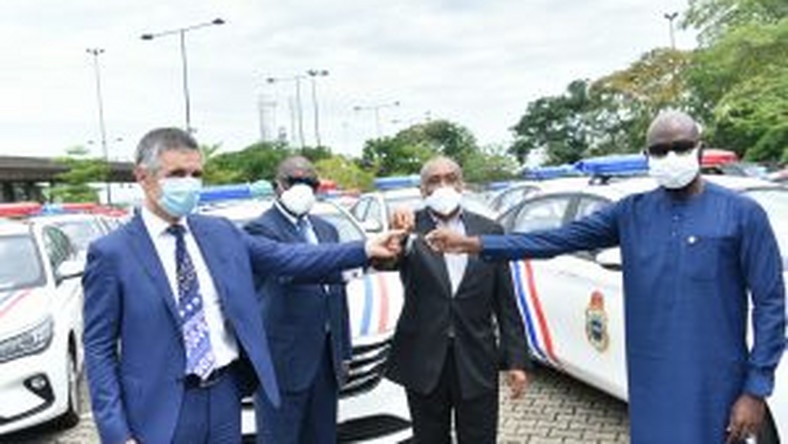 Group Managing Director, Dangote Cement Plc, Michel Puchercos Non-Executive Director, Dangote Cement Plc, Ernest Ebi, Non-Executive Director, Dangote Cement Plc, Emmanuel Ikhazobor; Executive Secretary, Lagos State Security Trust Fund, Abdurrazaq Balogun, during the presentation of 35 Police Patrol Cars to Lagos Security Trust Fund. [NAN]