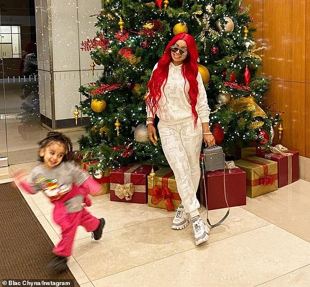 Bitter battle: The couple, who split soon after the alleged altercation in 2016, have also been in a heated child custody battle over their daughter Dream; Chyna is pictured with Dream