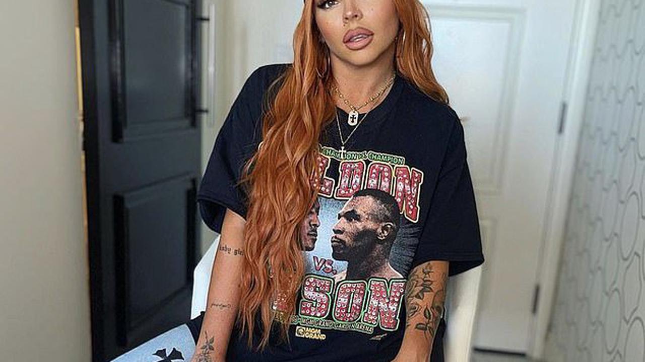 Jesy Nelson displays her edgy fashion sense in a Nineties inspired Mike Tyson T-shirt and jeans as she spends time in Los Angeles after overcoming jet lag