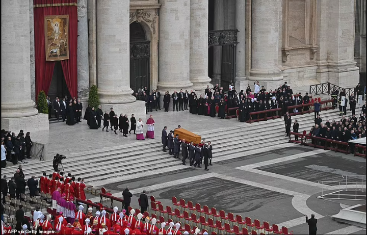 Pope Francis presides as Pope Benedict XVI is laid to rest (photos)