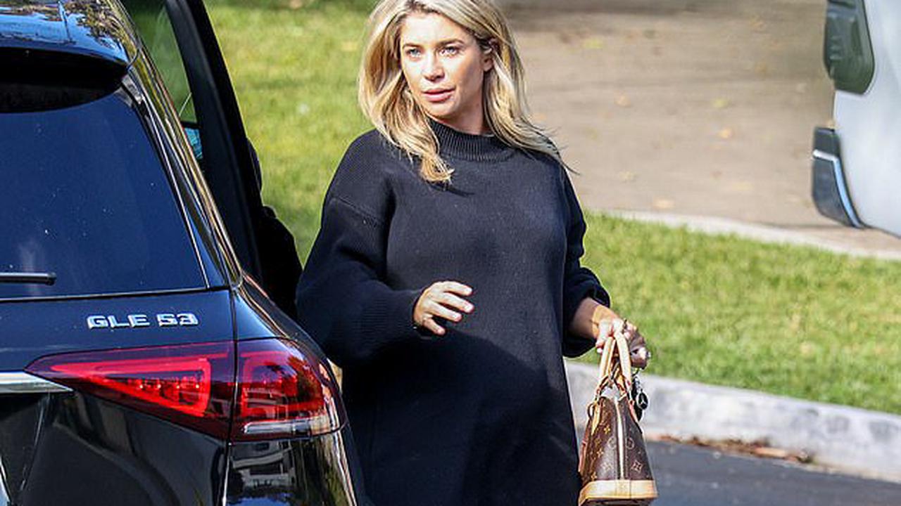 Kyle Sandilands' pregnant fiancée Tegan Kynaston covers up her baby bump in a chic sweater dress as she returns home from a shopping trip